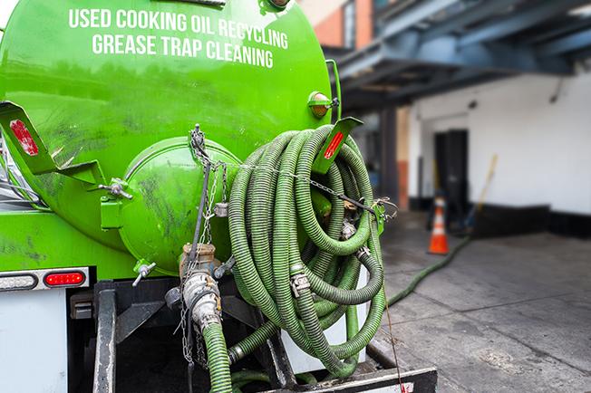 Grease Trap Cleaning of Quincy workers